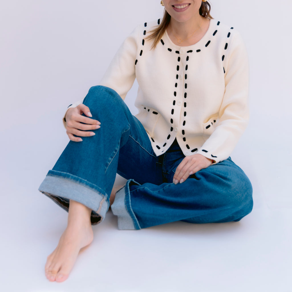 Sueter marfil con toques negros