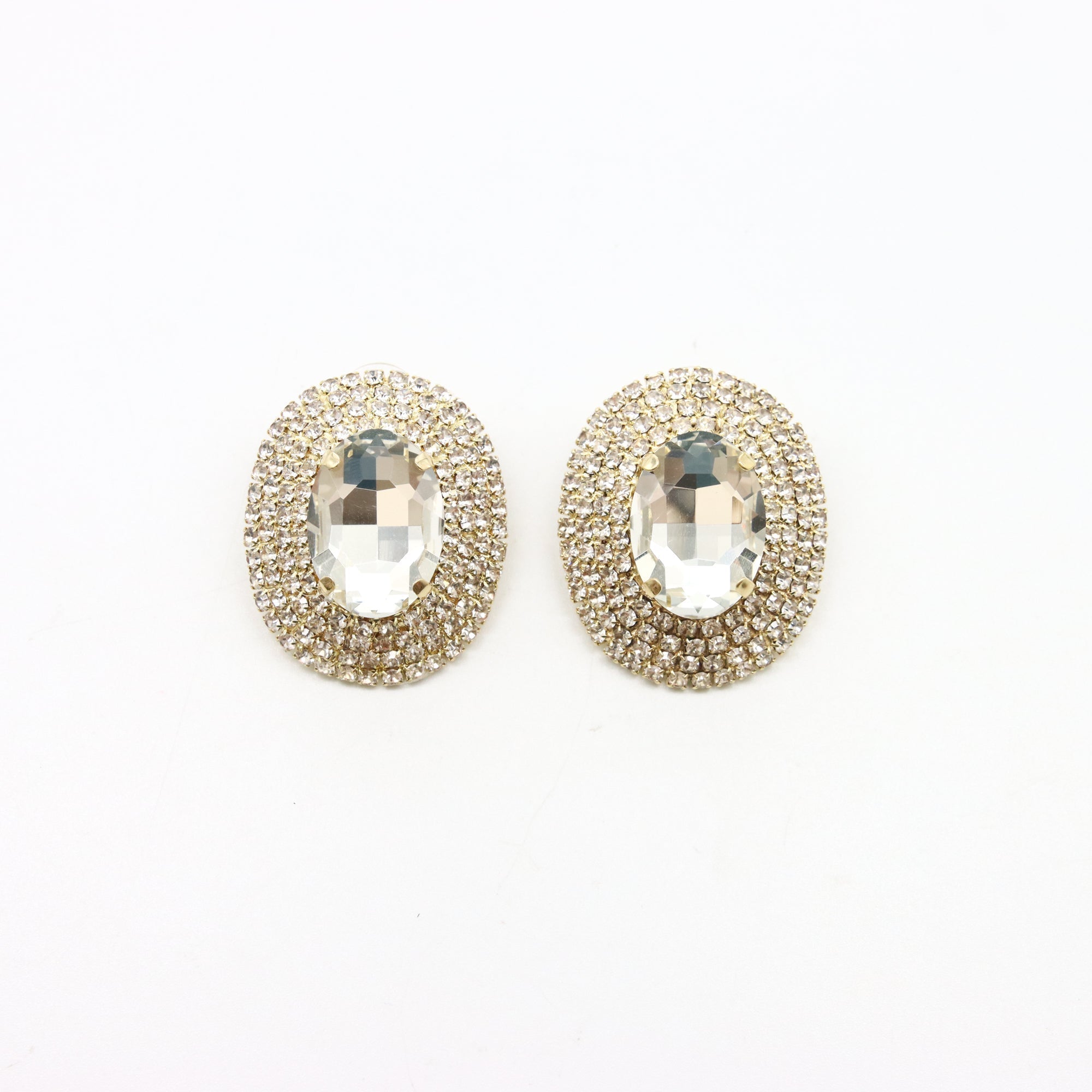 Aretes Circulares Brillantes con Baño de Rodio y Centro de Cristal Facetado