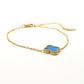Set anillo, pulsera y arete Flor azul