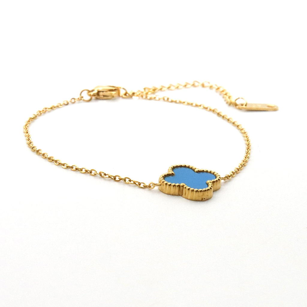 Set anillo, pulsera y arete Flor azul