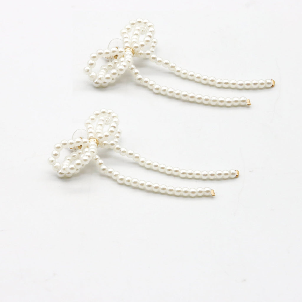 Aretes Moño perlas "coquette"