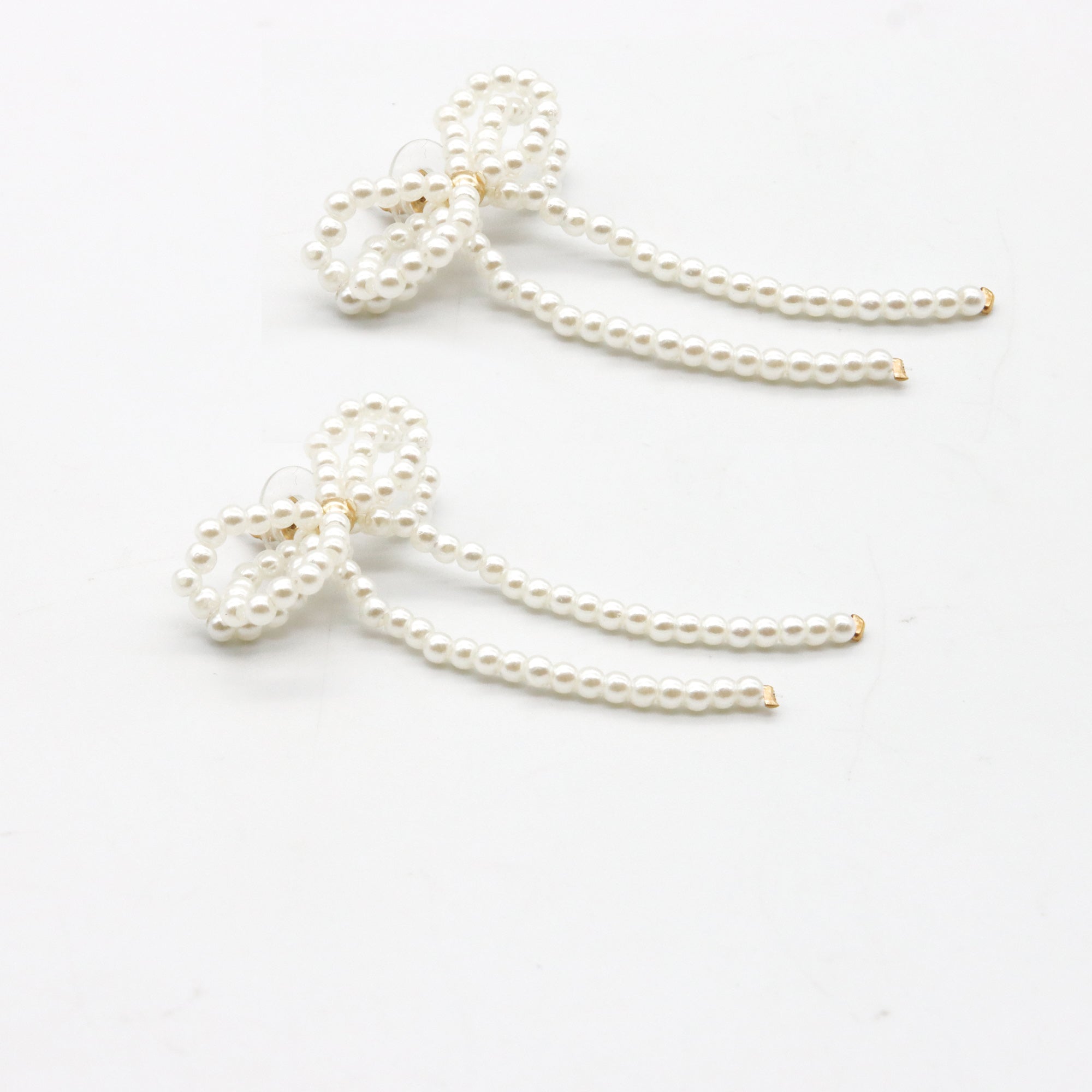 Aretes Moño perlas "coquette"