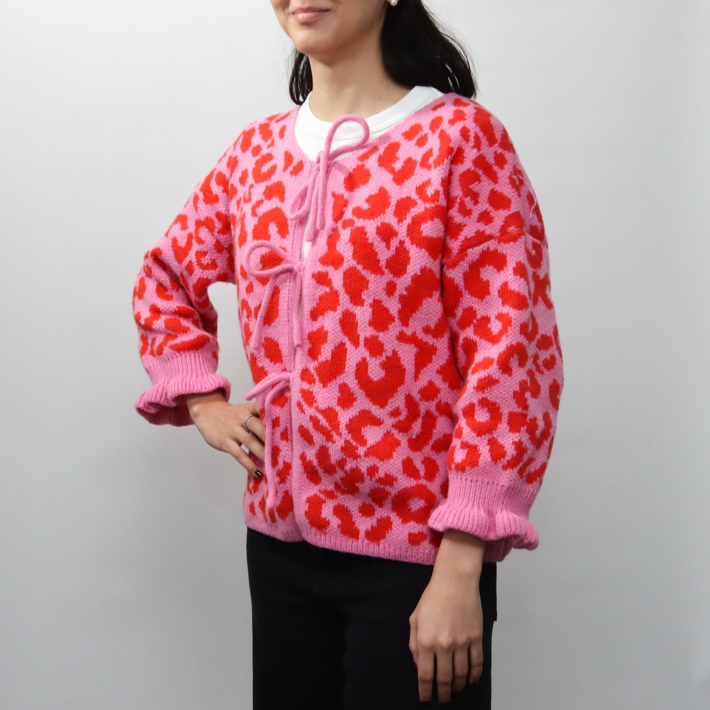 Suéter Rosa Animal Print con lazo
