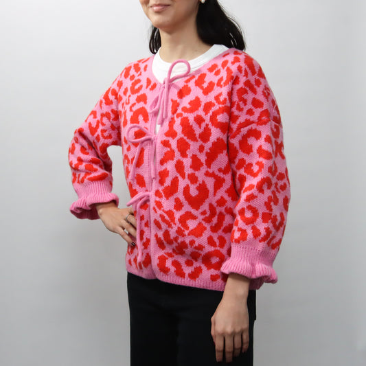 Suéter Rosa Animal Print con lazo