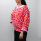 Suéter Rosa Animal Print con lazo