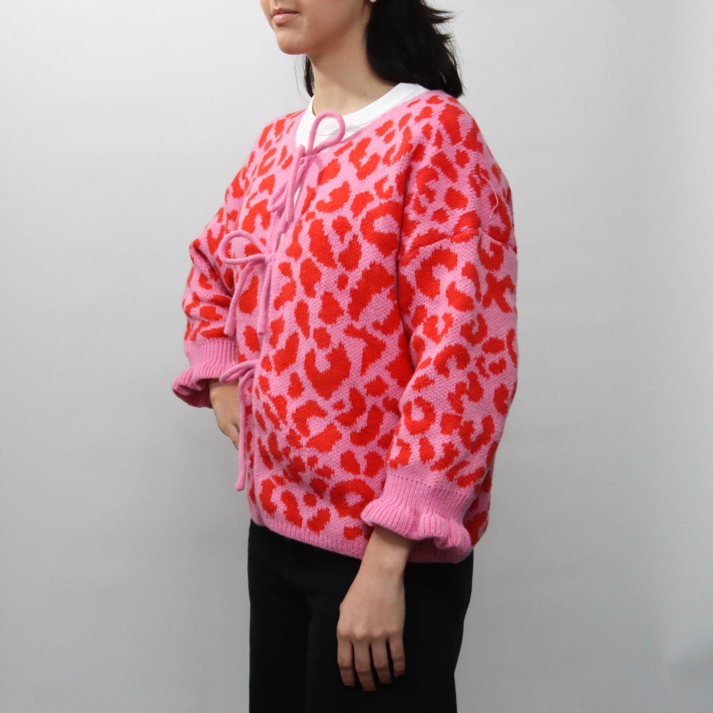 Suéter Rosa Animal Print con lazo
