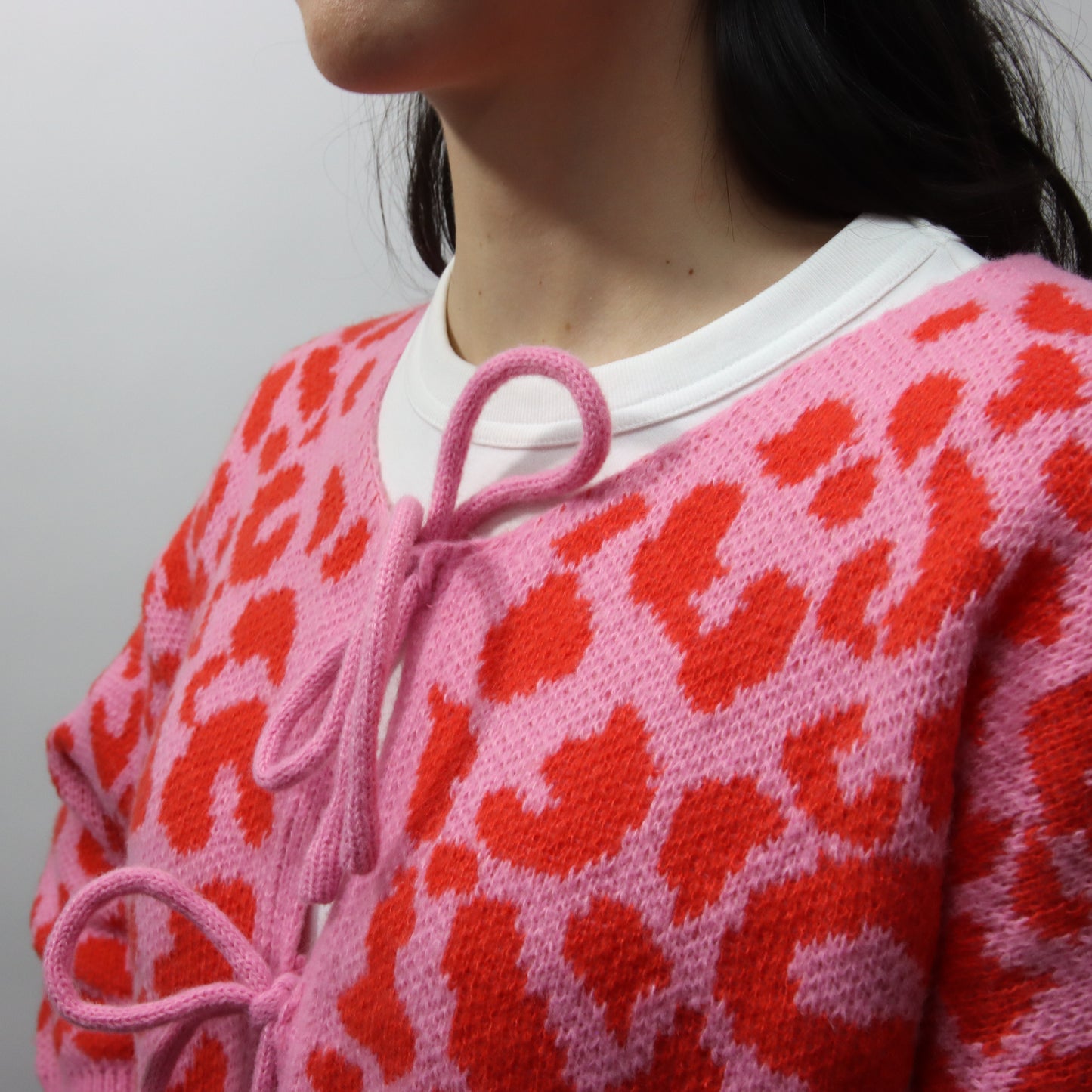 Suéter Rosa Animal Print con lazo