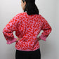 Suéter Rosa Animal Print con lazo